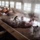 Workers spread sorghum as it is prepared for the first fermentation to be used in baijiu at the Maopu Health Liquor Co. Distillery in Guizhou province, China.